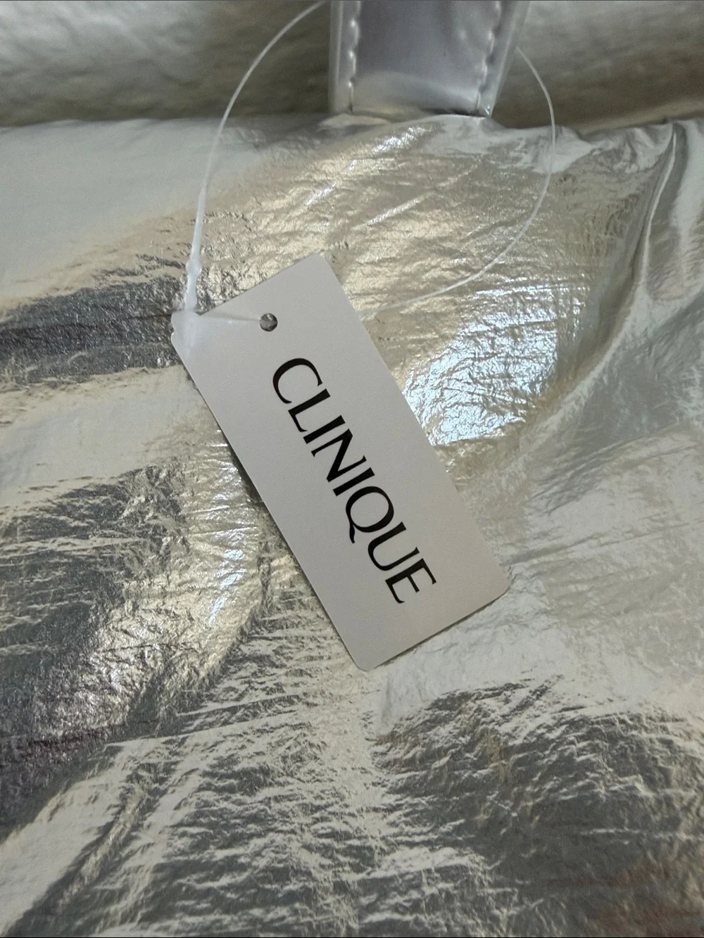 Clinique Silver Padded Tote with Matching Cosmetic Pouch and Never Used Products